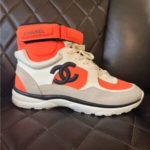 CHANEL Vibrant Orange and Cream Sneakers